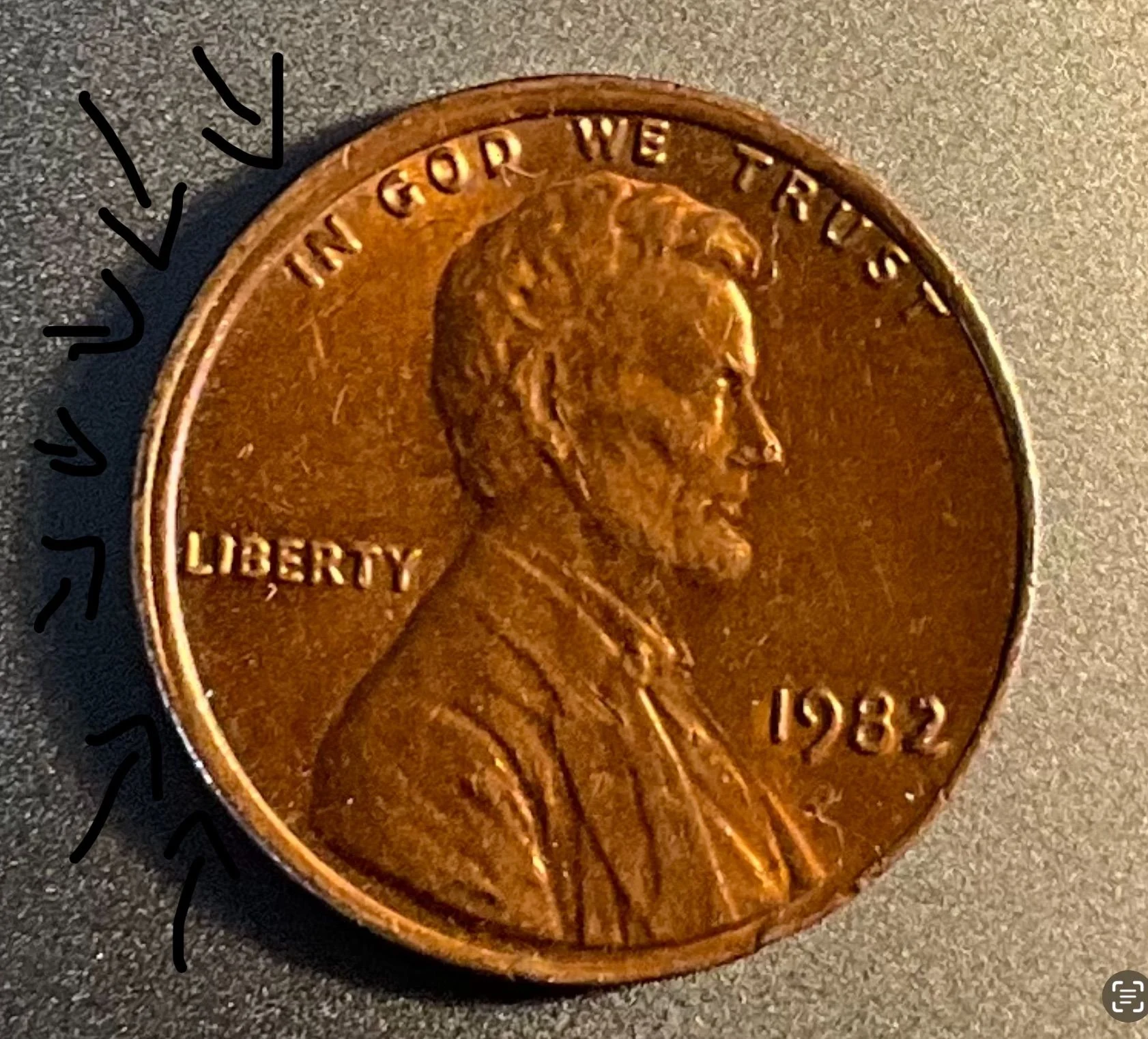1982 penny dramatic off-center strike error showing partial design with date still visible and broad unstruck planchet area