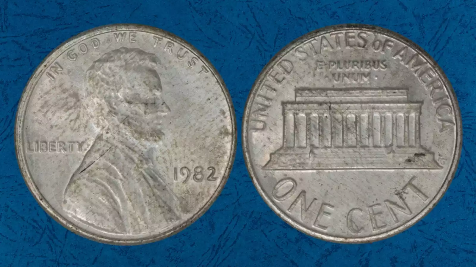 1982 penny wrong planchet or off-metal error showing unusual size or weight on scale compared to standard Lincoln cent